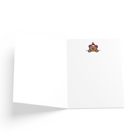 White card with a brown bear peeking on the inside.