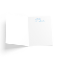 Inside of card has blue clouds at the top of the greeting card.