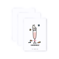 Trio pack of greeting cards. Bunny in champagne glass illustration doodle. Card reads "congrats!"