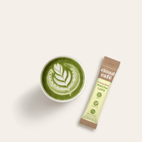 Matcha latte with a cloud café matcha latte powder sachet on a white background