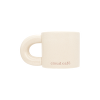 Sandstone-colored mug with 'cloud café' text on a white background