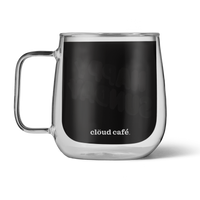 Clear mug with cold brew and 'Clöud Café' branding 