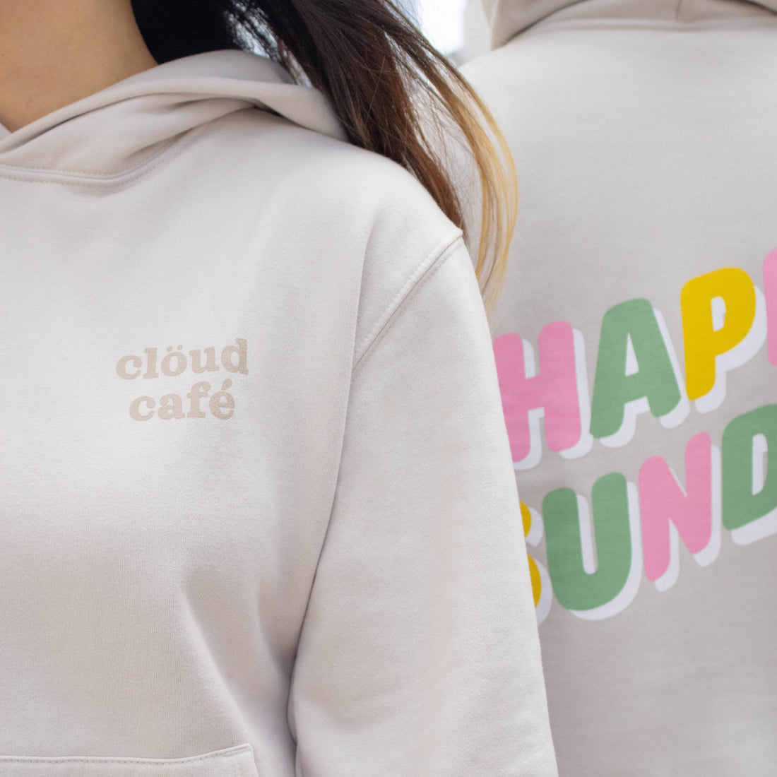 Front of hoodie with "clöud café" logo.