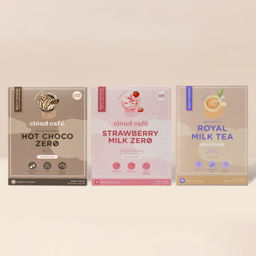 Hot Choco, Strawberry Milk Zero, and Royal Milk Tea boxes on a cream background