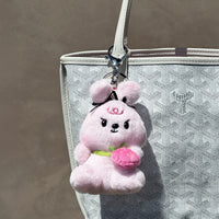 Oakhee keychain plush attached to bag in lifestyle setting