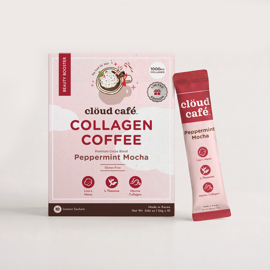 Cloud Café Collagen Coffee Peppermint Mocha in a pink and white box with a single sachet standing beside it on a clean white background.