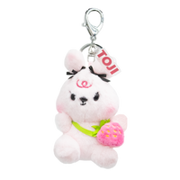 Light pink plush bunny keychain with a bows on ears and a small pink strawberry purse. 