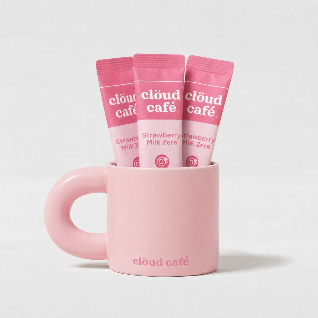 Clöud Café pink mug with rounded thick handle against a white background