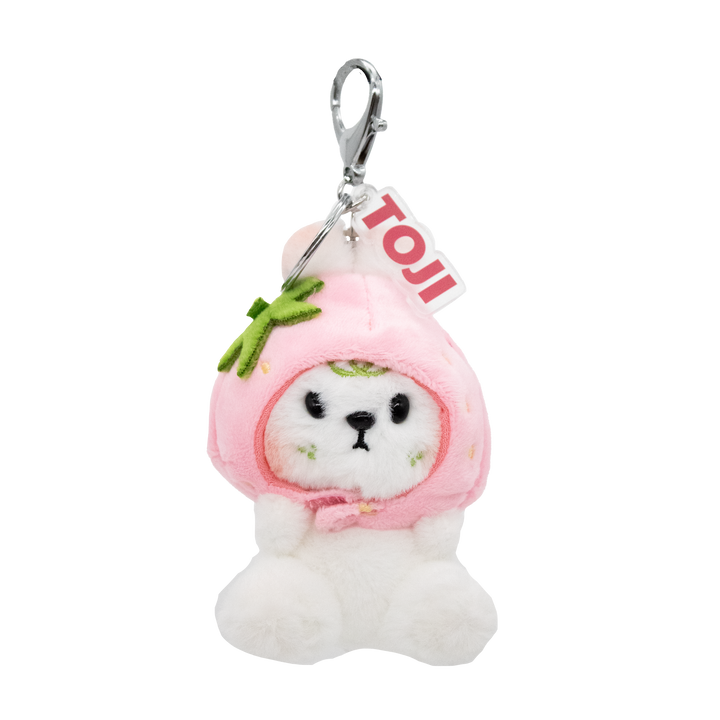 Plush keychain of a white bunny in a pink strawberry hood with a 'TOJI' acrylic clear tag on a white background. Silver lobster clasp keyring.